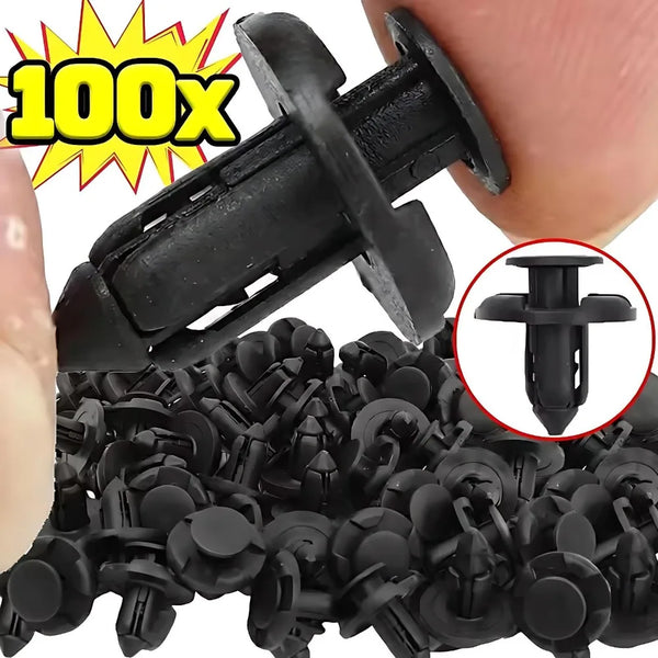 A close-up of black plastic bumper clips, including a large clip and smaller individual clips, used for automotive applicatio
