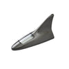 A sleek, silver solar car antenna with a shark fin design mounted on a roof.