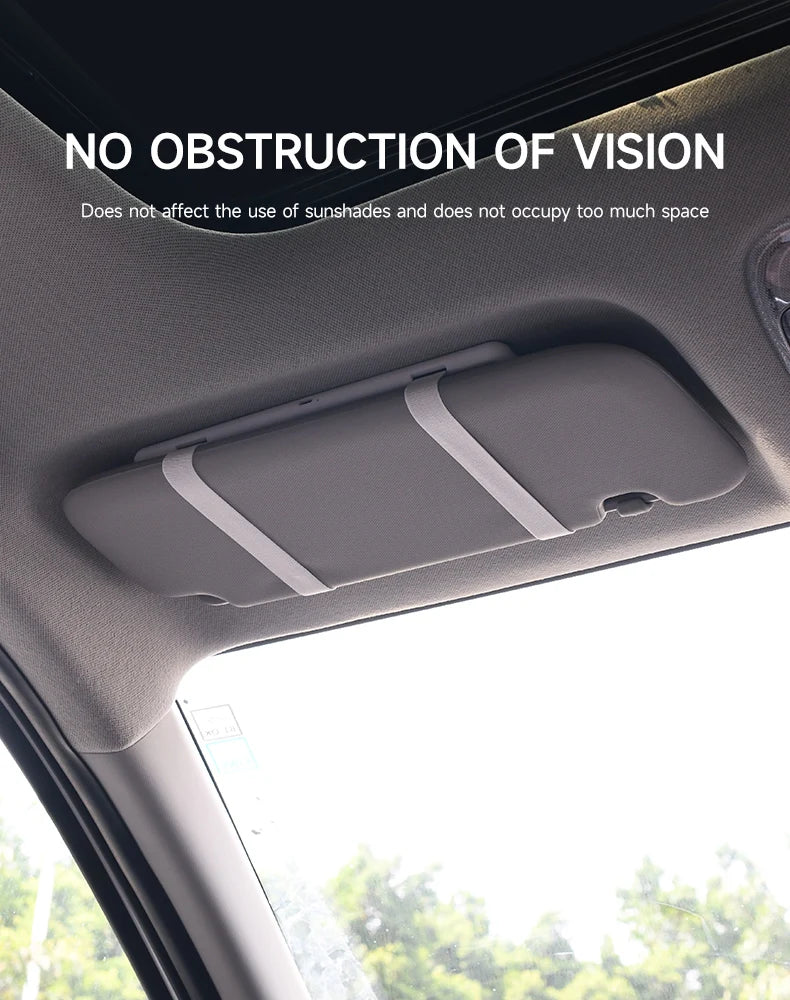 A gray car makeup mirror is shown mounted on the interior of a vehicle, emphasizing no obstruction of vision.