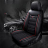 Black PU leather car seat covers installed in a dark SUV interior, showing the seat and surrounding vehicle.