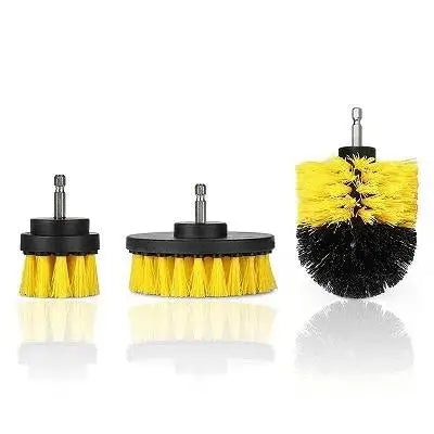 A set of three yellow and black power scrubber brushes for drill attachments.