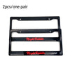 Two black JDM racing style license plate frames for decoration.