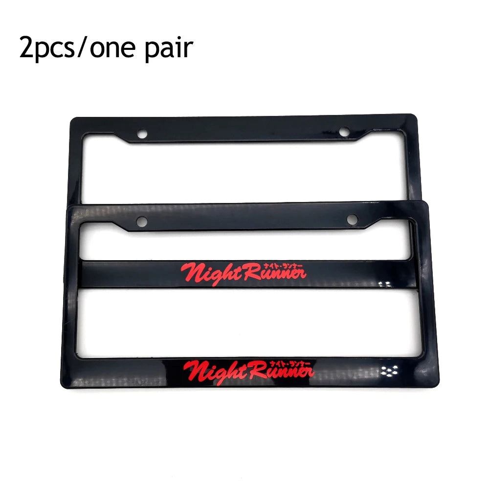 Two black JDM racing style license plate frames for decoration.