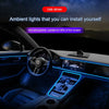 A flexible USB LED light strip installed in the interior of a car dashboard and steering wheel area.