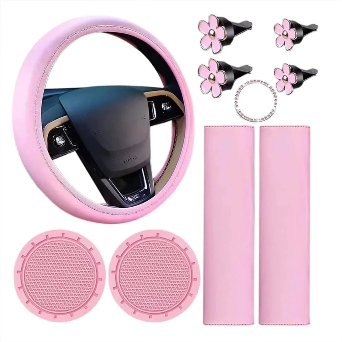 A set of pink car interior accessories including a steering wheel cover, grips, and comfort pads.