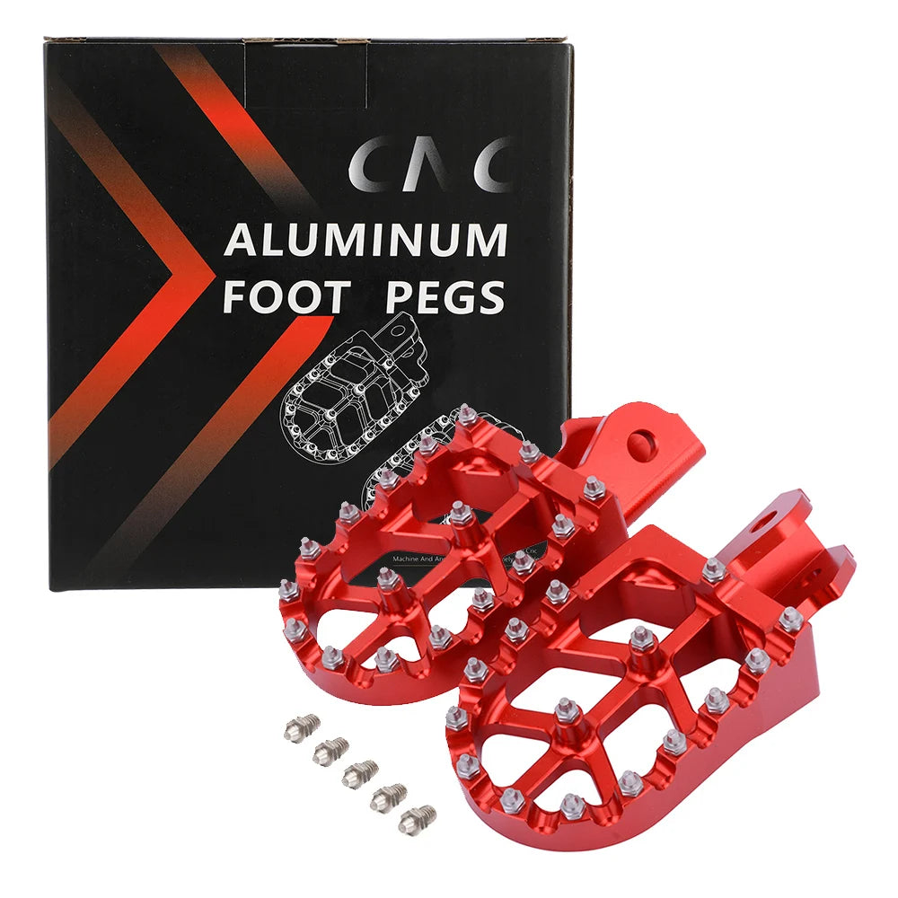A box of aluminum foot pegs for motorcycles with several bright red metal pegs and hardware.