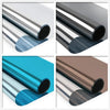 Four views of silver reflective privacy window film rolled into tubes showing different shades and finishes.
