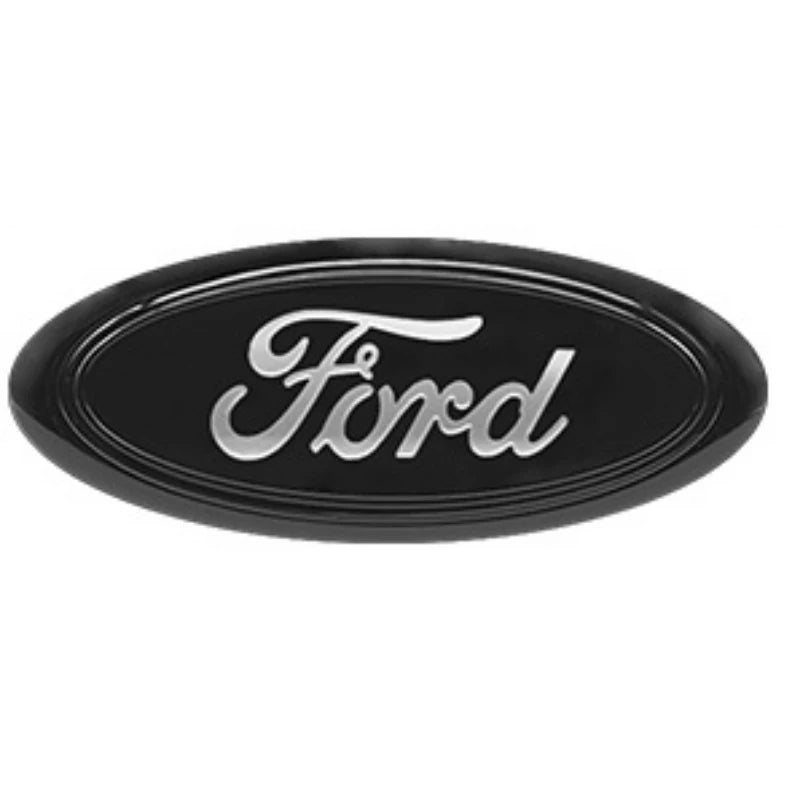 Emblème de voiture sur mesure ovale noir avec le mot Ford en écriture argentée gravé.