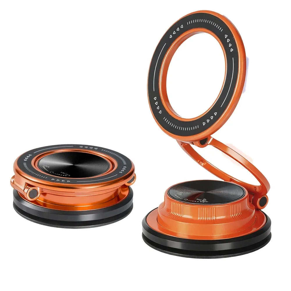 Support magnétique rotatif orange et noir pour téléphone avec anneau de montage circulaire.