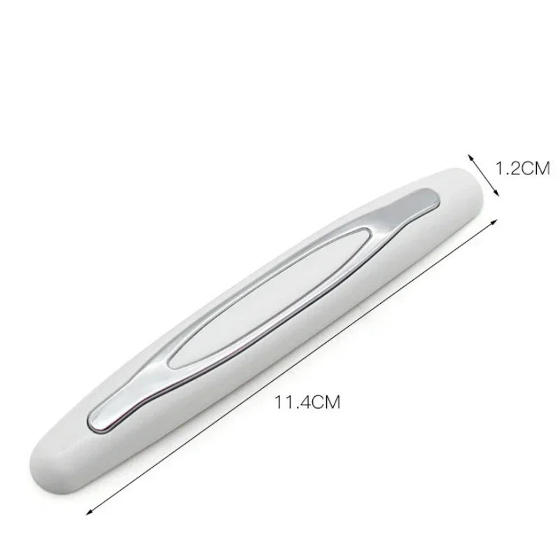 A white car door edge protection strip shown in profile with dimensions of 1.2cm and 11.4cm.