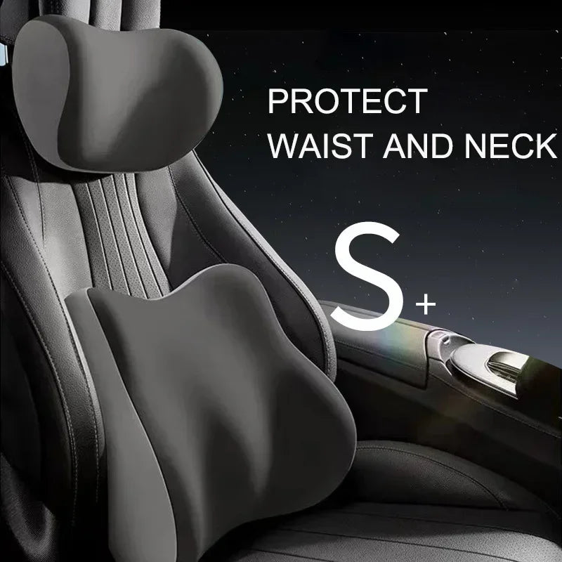 Close-up of a black ergonomic memory foam pillow designed for car neck and lumbar support.