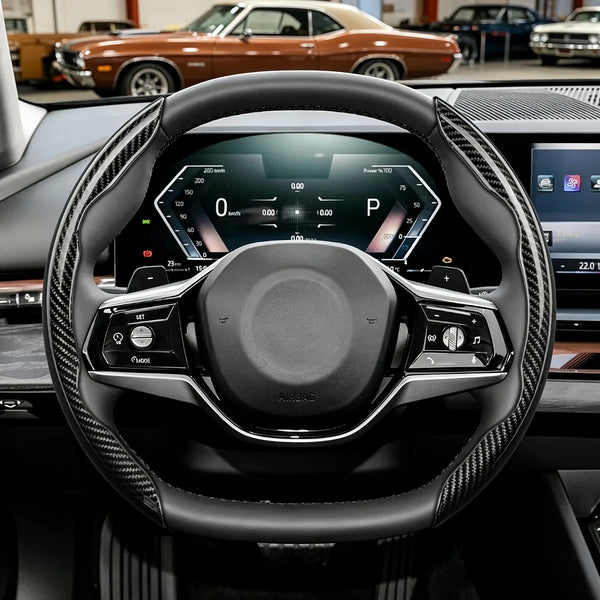 Close-up view of a black carbon fiber steering wheel cover inside a modern vehicle cockpit.