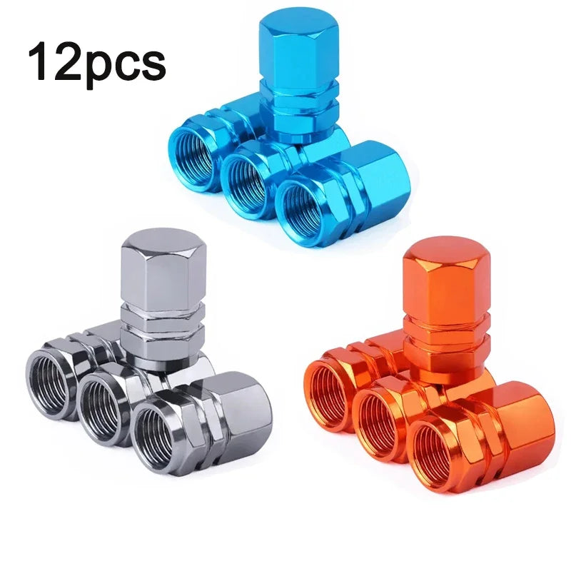 Twelve aluminum alloy tire valve caps in blue and orange colors.