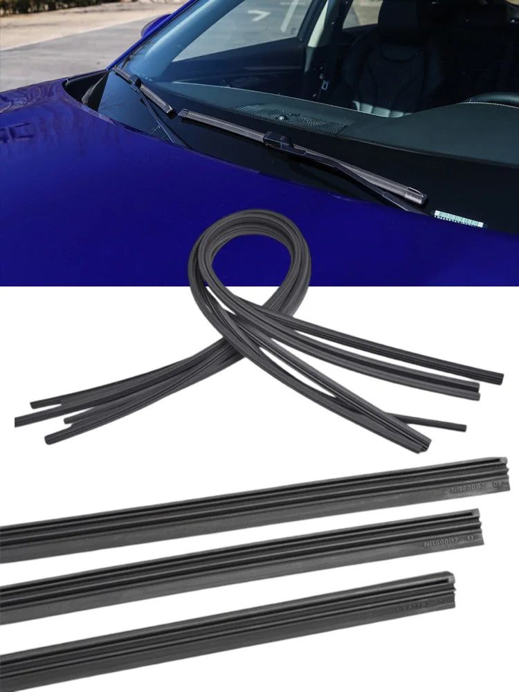 A set of black natural rubber windshield wiper blade inserts for a car.