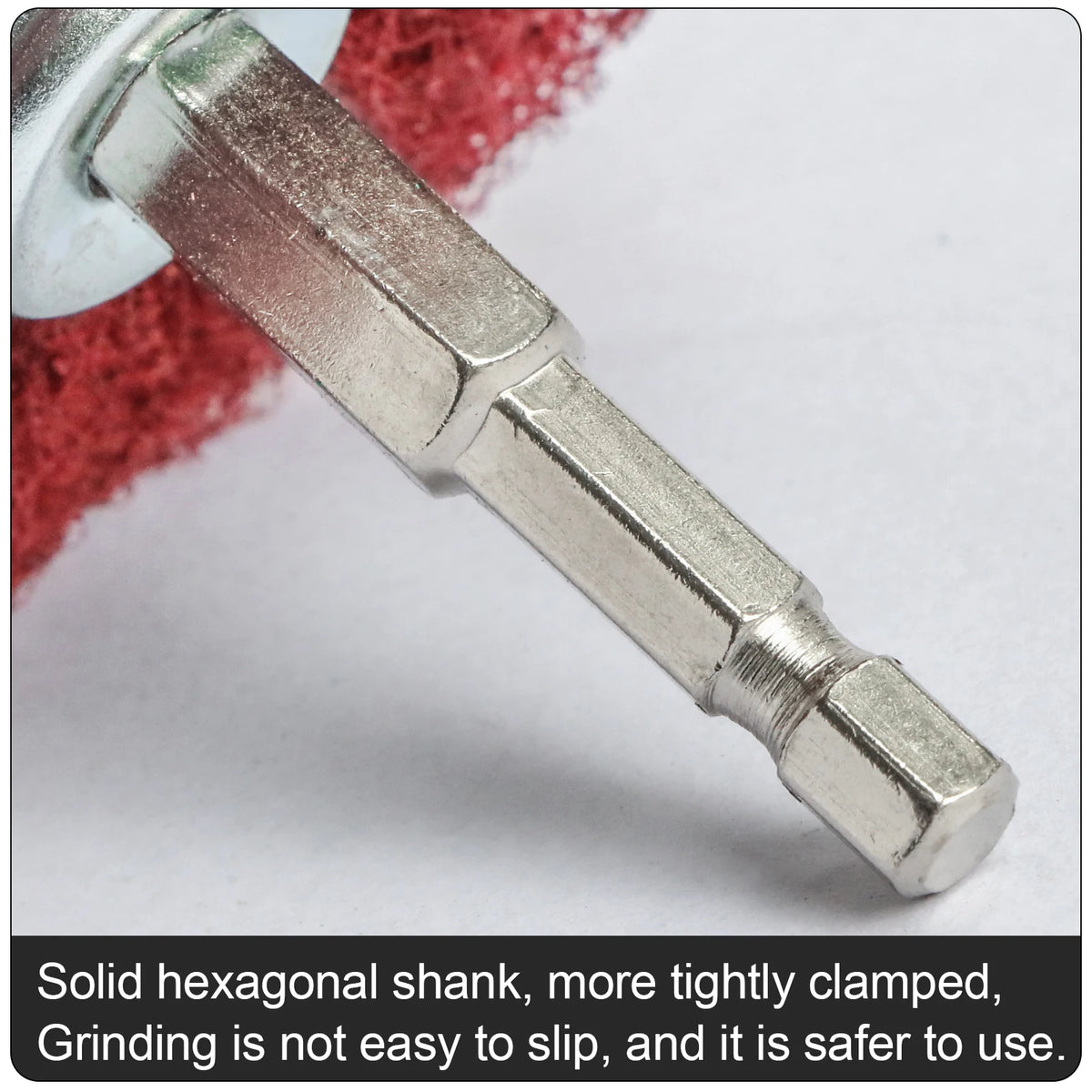 A close-up view of a silver hexagonal shank tool used for clamping and grinding.