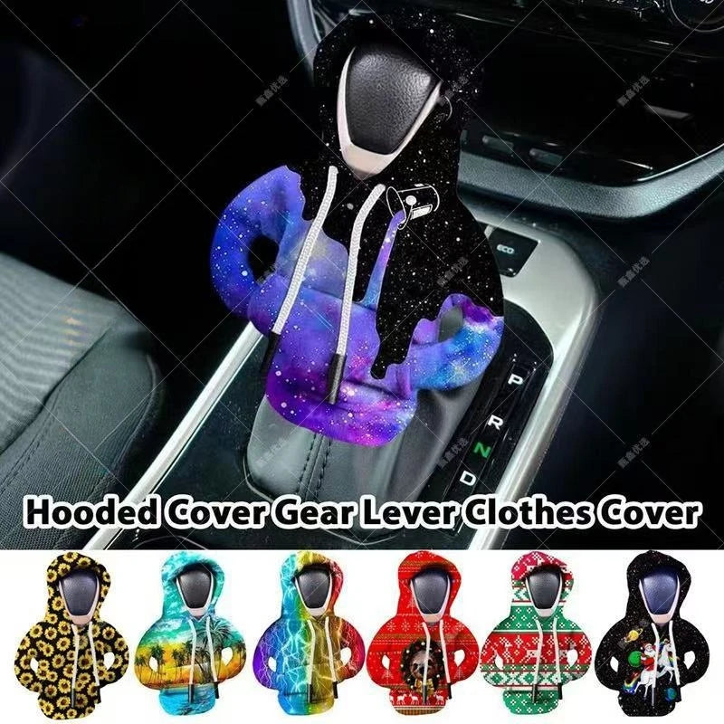 A collection of hooded knit covers in various colors and patterns for a gear lever.
