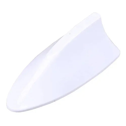 White decorative car antenna cover shaped like a shark fin
