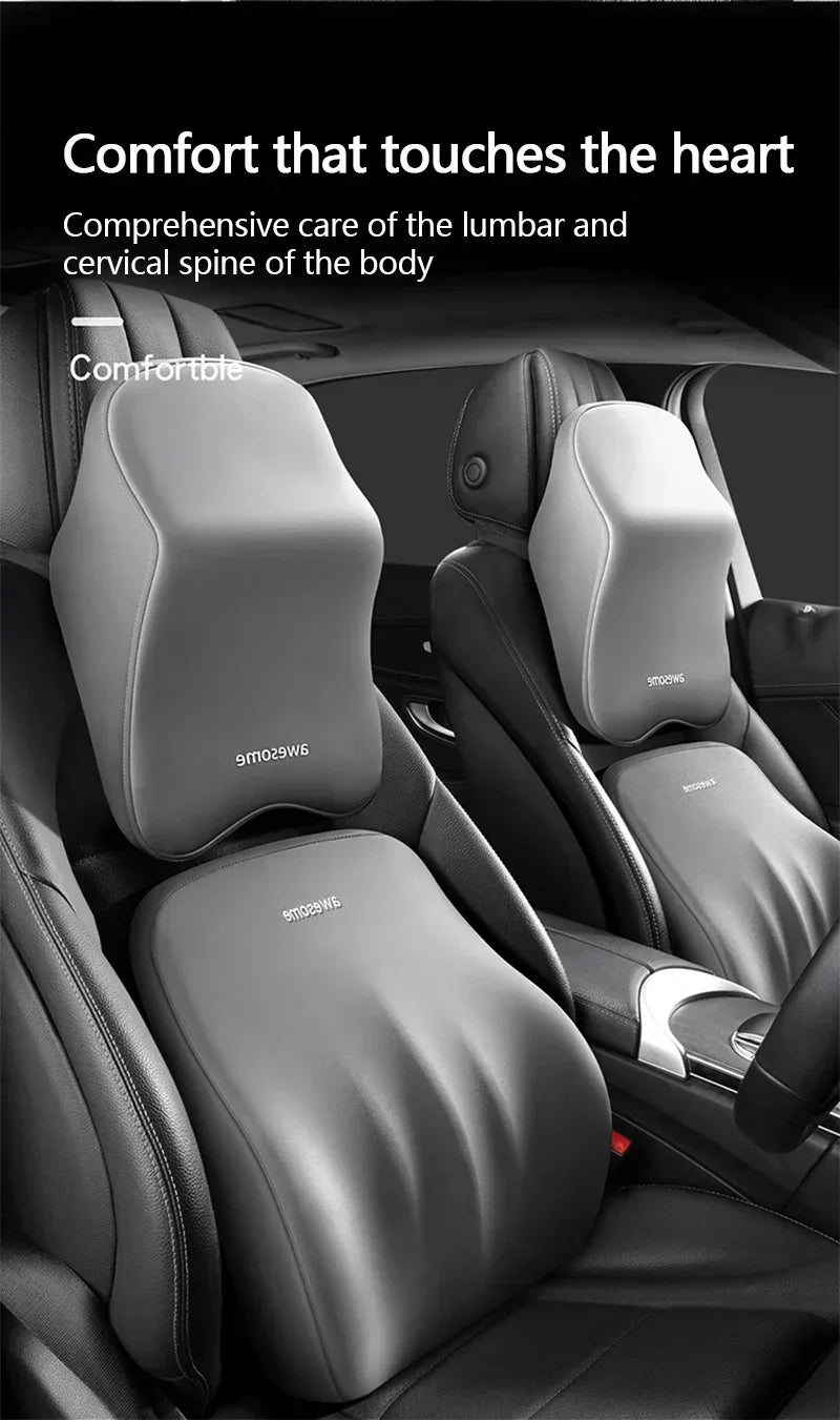 A close-up view of a black ergonomic lumbar and cervical spine support cushion installed in a car seat.
