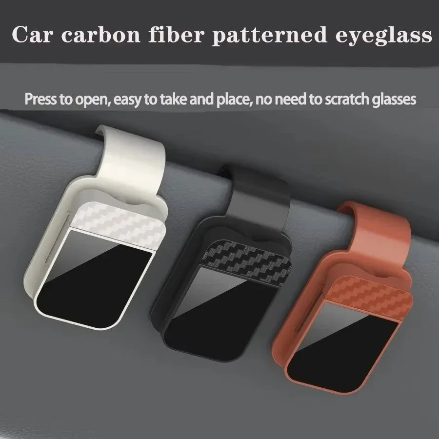Car carbon fiber patterned eyeglasses clip holder shown in white, black, and orange colors