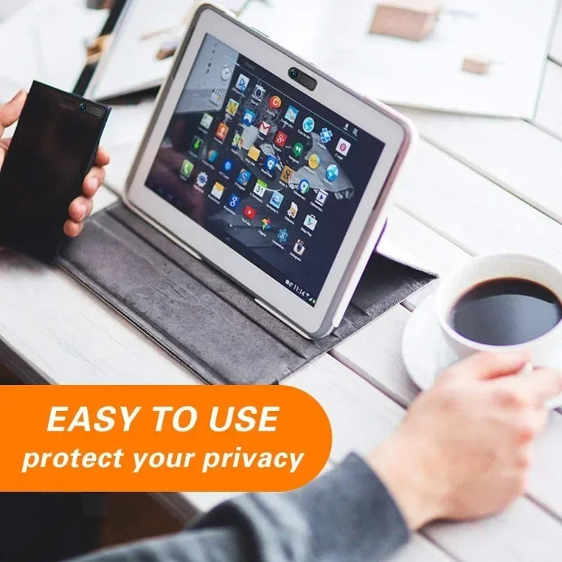 A hand is placing a sliding privacy camera cover onto an iPad, emphasizing easy to use privacy protection.