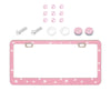 A pink crystal rhinestone license plate frame with mounting hardware and decorative rhinestones.
