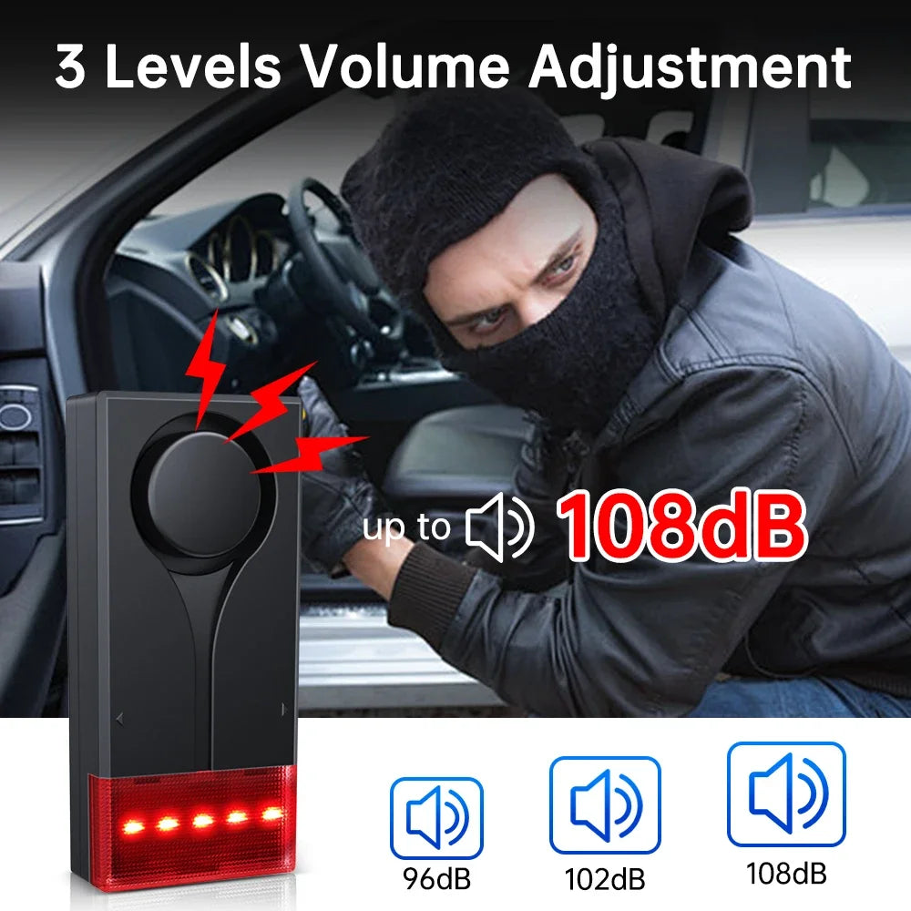 A black portable volume adjustment device with LED lights is shown next to a person in a jacket inside a car.