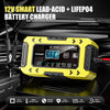 A yellow 12V smart lead-acid and LiFePO4 battery charger device is shown in a close-up on a black surface.