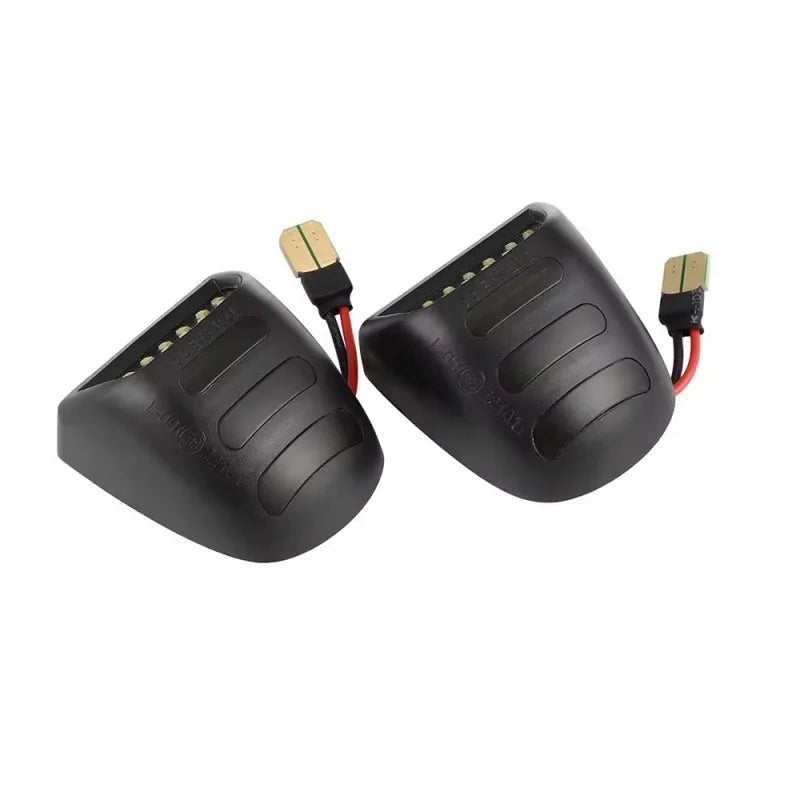 Black SMD LED license plate lights for Chevrolet trucks with electrical connectors.