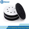 Three black abrasive interface pads with holes stacked on a white background.