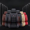 A set of black PU leather car seat covers for SUV and car interior displayed against a dark background.
