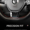 Close-up of a black universal car steering wheel cover with a leather-like grip and airbag housing.