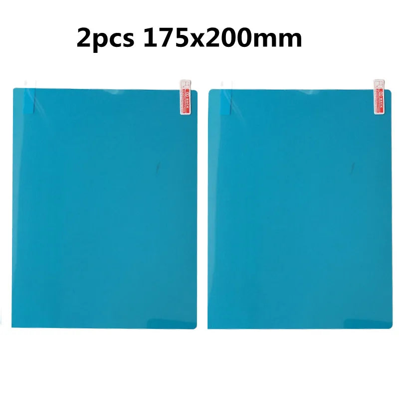 Two sheets of clear anti-fog and rainproof car mirror protection film, 175x200mm each.