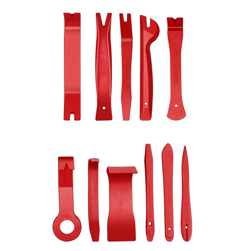 Un jeu d'outils pour retirer les garnitures automobiles rouges, comprenant divers outils en plastique de différentes formes p