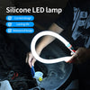 A hand holds a silicone LED lamp, highlighting its curved design and waterproof features.
