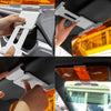 Hands installing a dual-function anti-glare car sun visor onto a vehicle's interior panel.