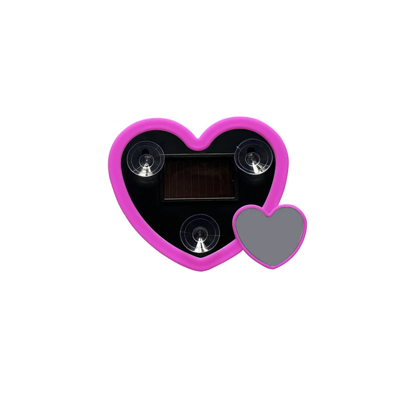 A decorative heart-shaped solar lamp with a dark panel and two light fixtures.