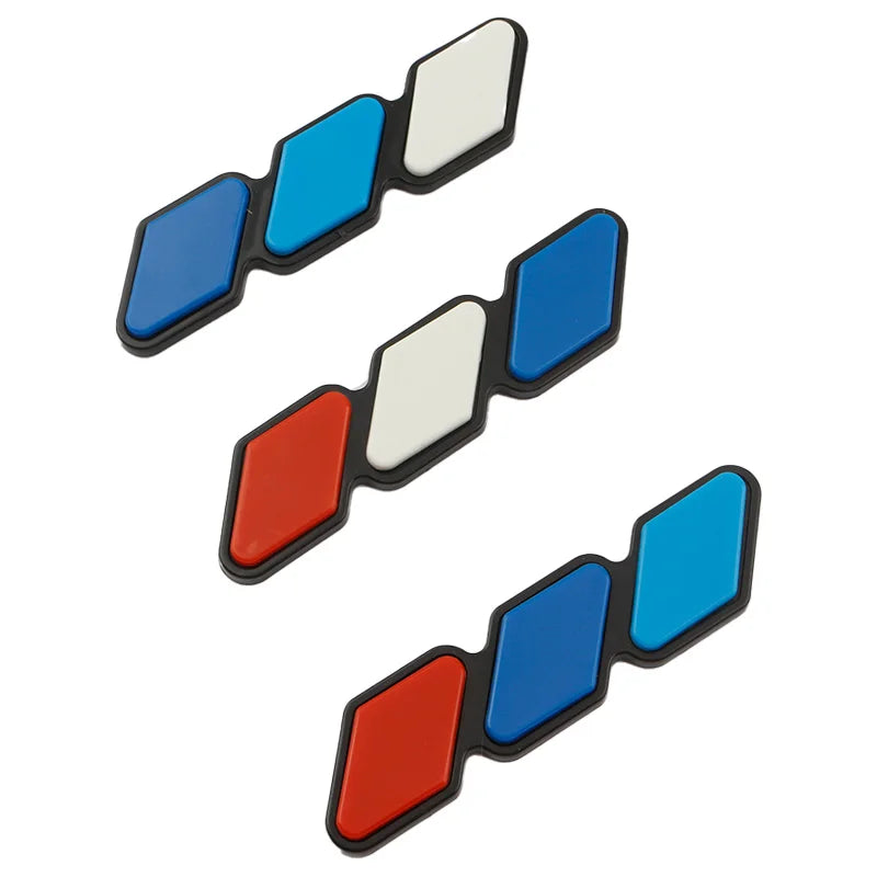 Three rectangular decals in black and white feature blue and red sections for car grills