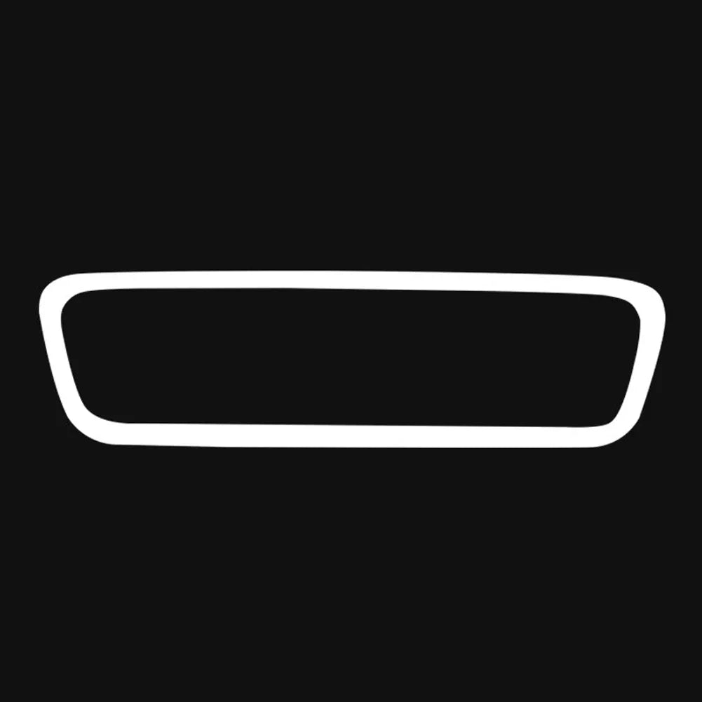 White silicone edge protector for a vehicle's rearview mirror.