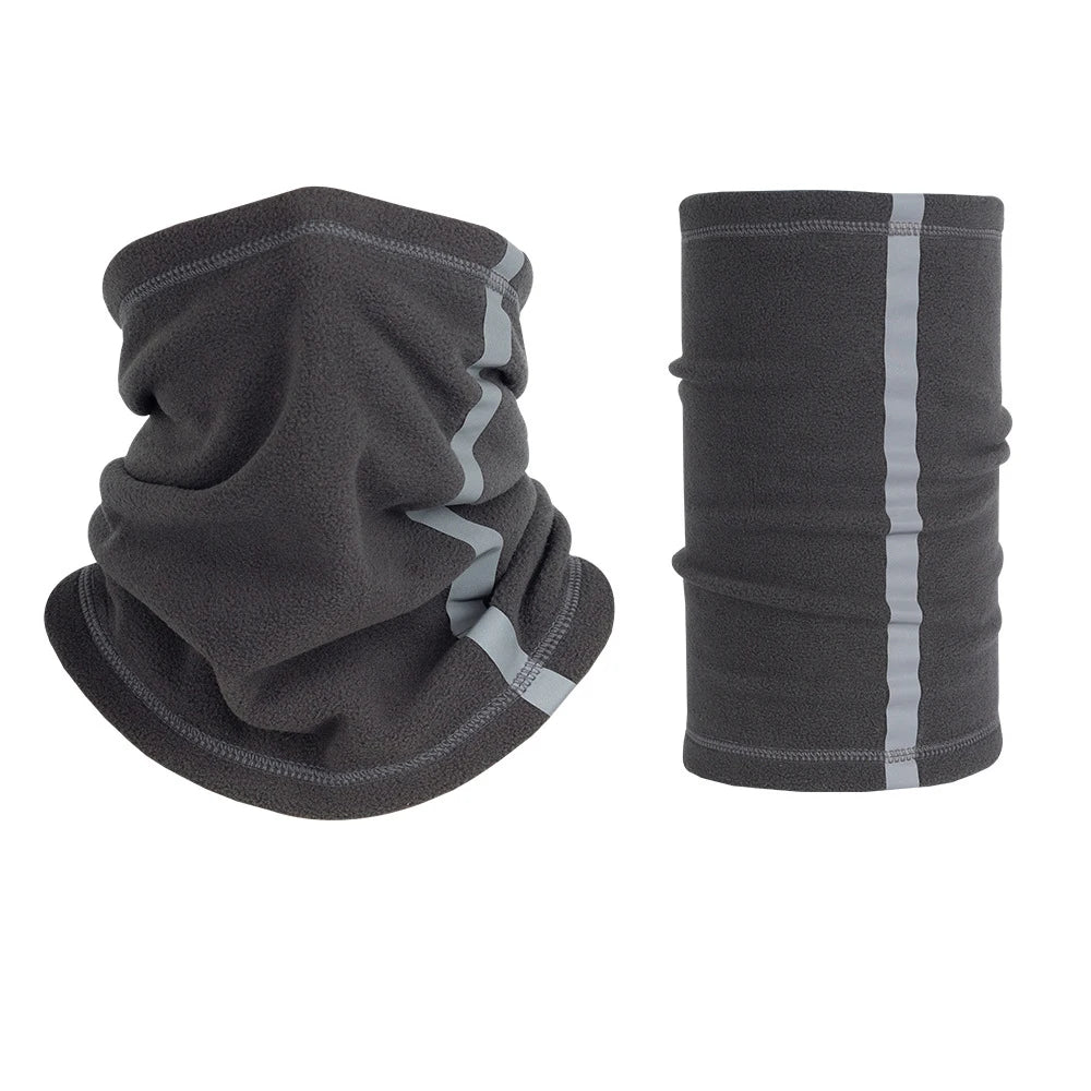 A dark gray fleece neck warmer scarf shown folded and rolled.