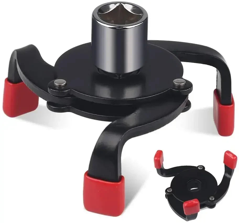 A black oil filter removal tool with a silver filter holder and red grips.