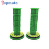 Two green gel rubber handlebar grips with circular bases