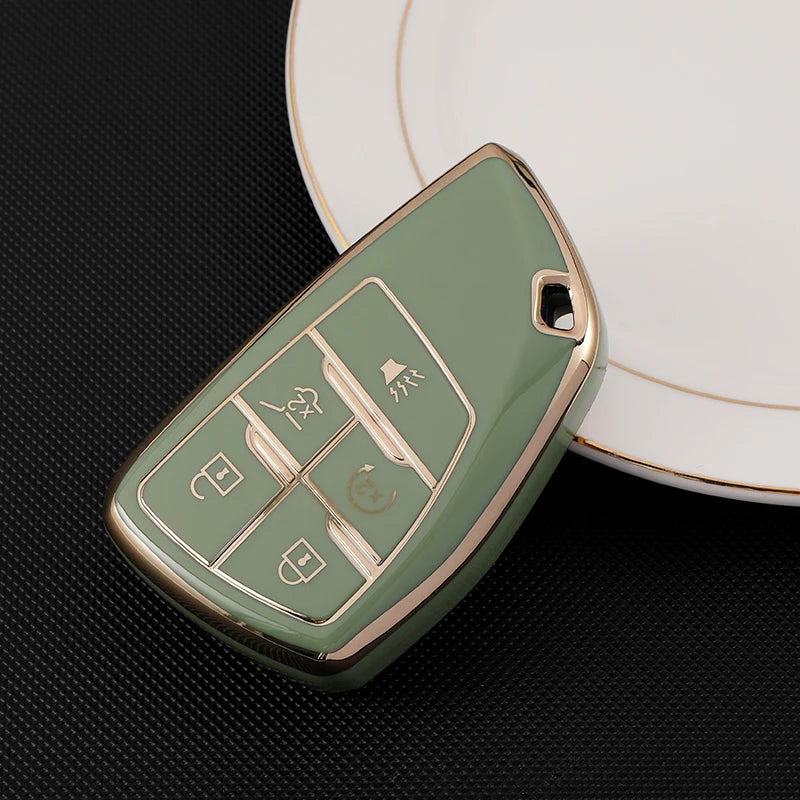 A light green multi-function car key cover rests on a white plate.