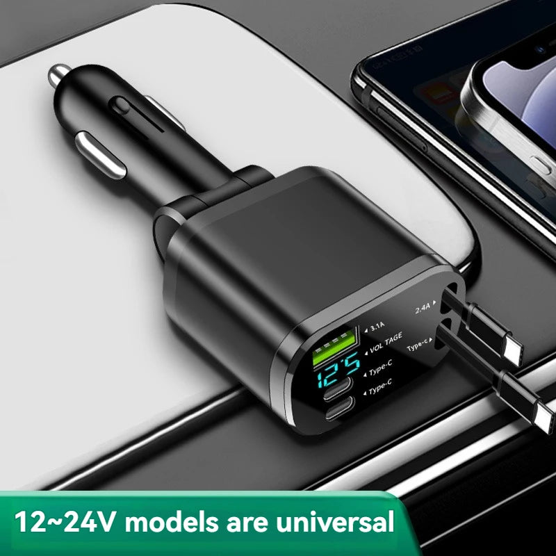 A black universal car charger with a retractable cable is shown resting on a white surface next to a smartphone.