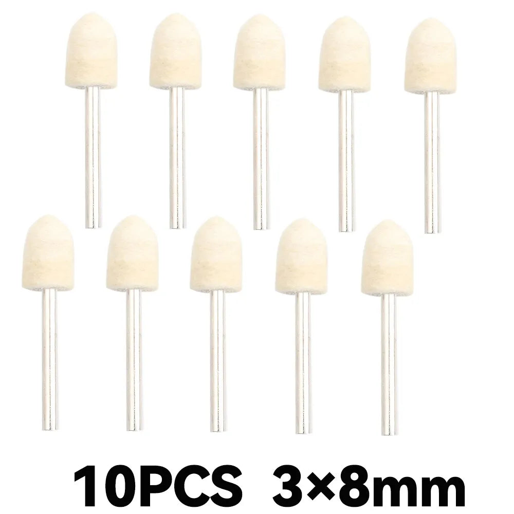 Ten pieces of light beige wool felt polishing buffing wheels with metal shafts.