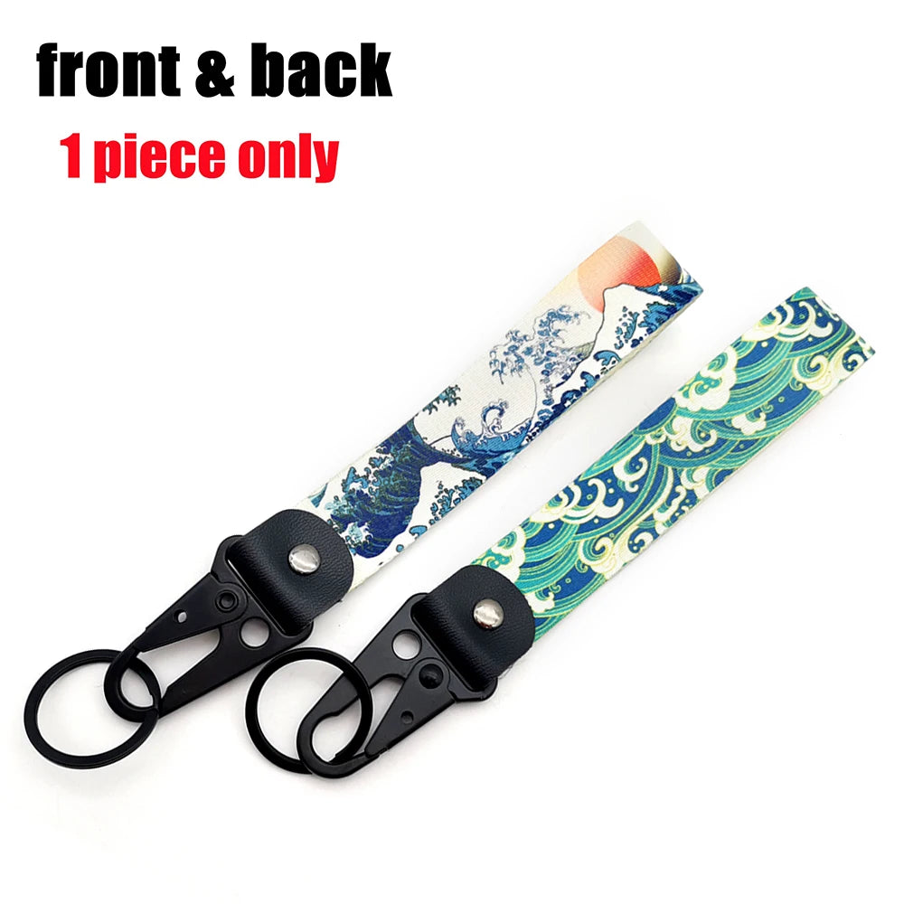 Front and back 1 piece only JDM car keychain lanyard featuring a blue and white wave pattern