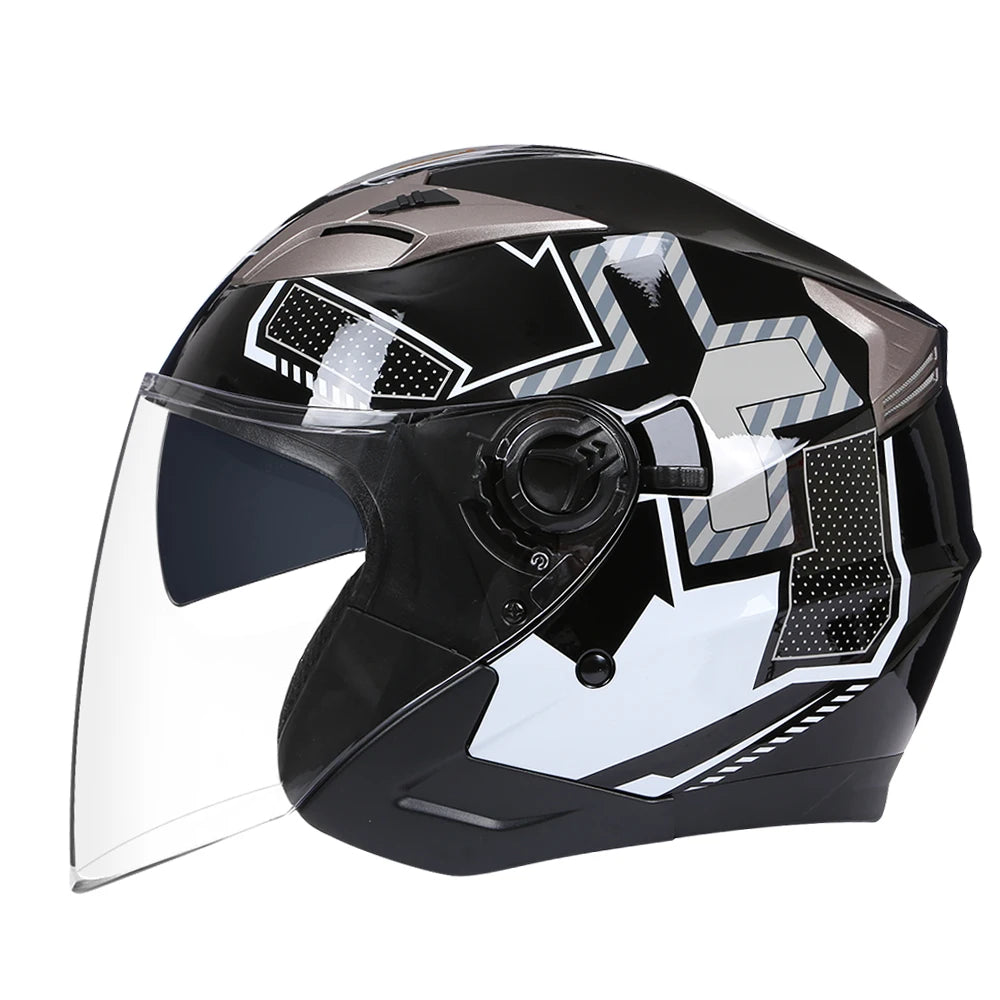 A black motorcycle helmet with a clear visor and silver and black graphic accents.