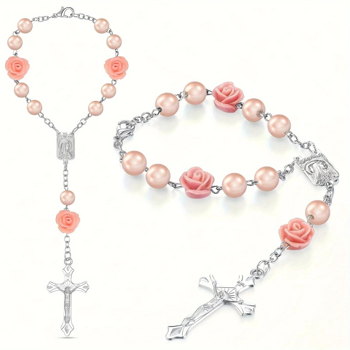 Silver rosary necklace featuring pink rose beads and a cross pendant