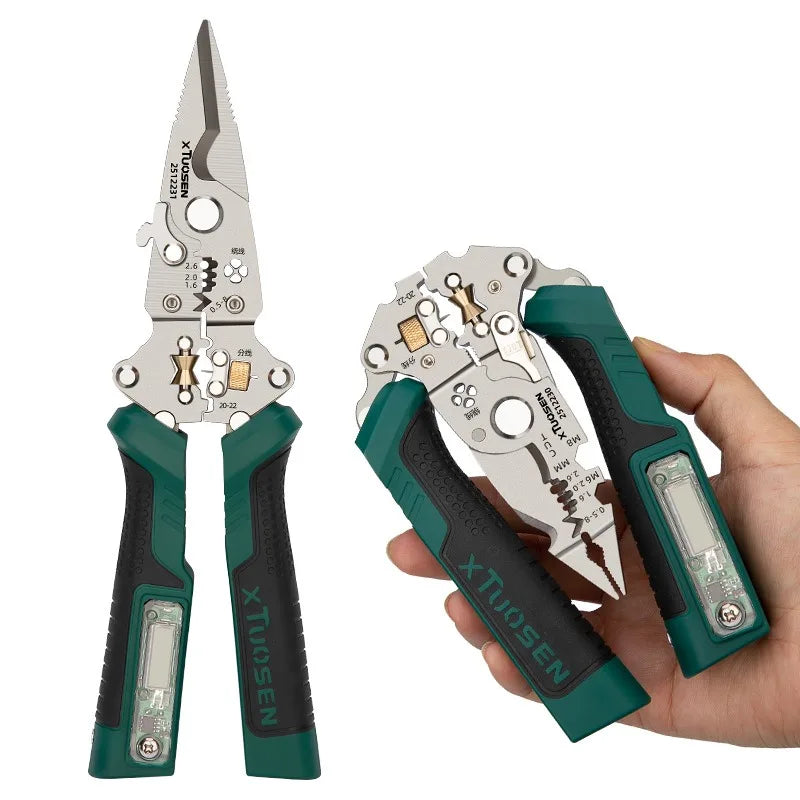 A hand holds a pair of green and silver multi-function electrician tools.