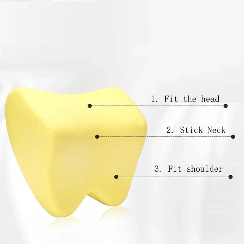 Yellow memory foam car headrest neck pillow showing three fitting points for adjustment