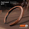 A close-up of a brown peach wood grain anti-slip steering wheel cover designed for a comfortable grip.